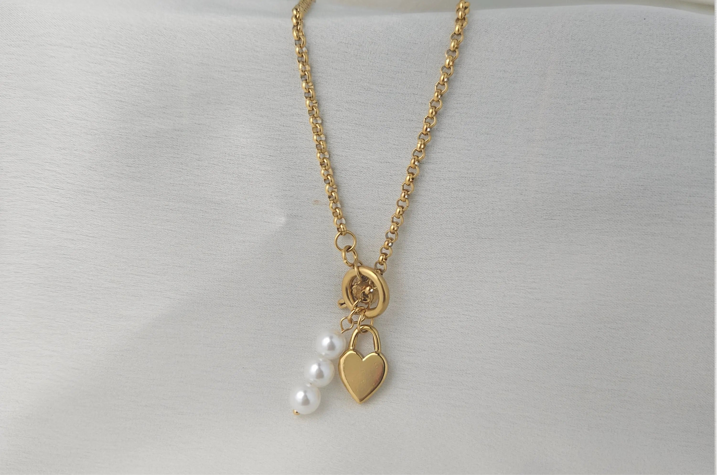 Gold Heart Lock Charm Necklace with Pearl Trio – Playful Romantic Jewelry
