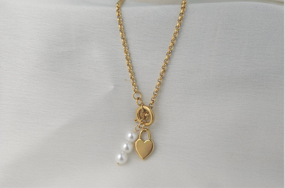 Gold Heart Lock Charm Necklace with Pearl Trio – Playful Romantic Jewelry