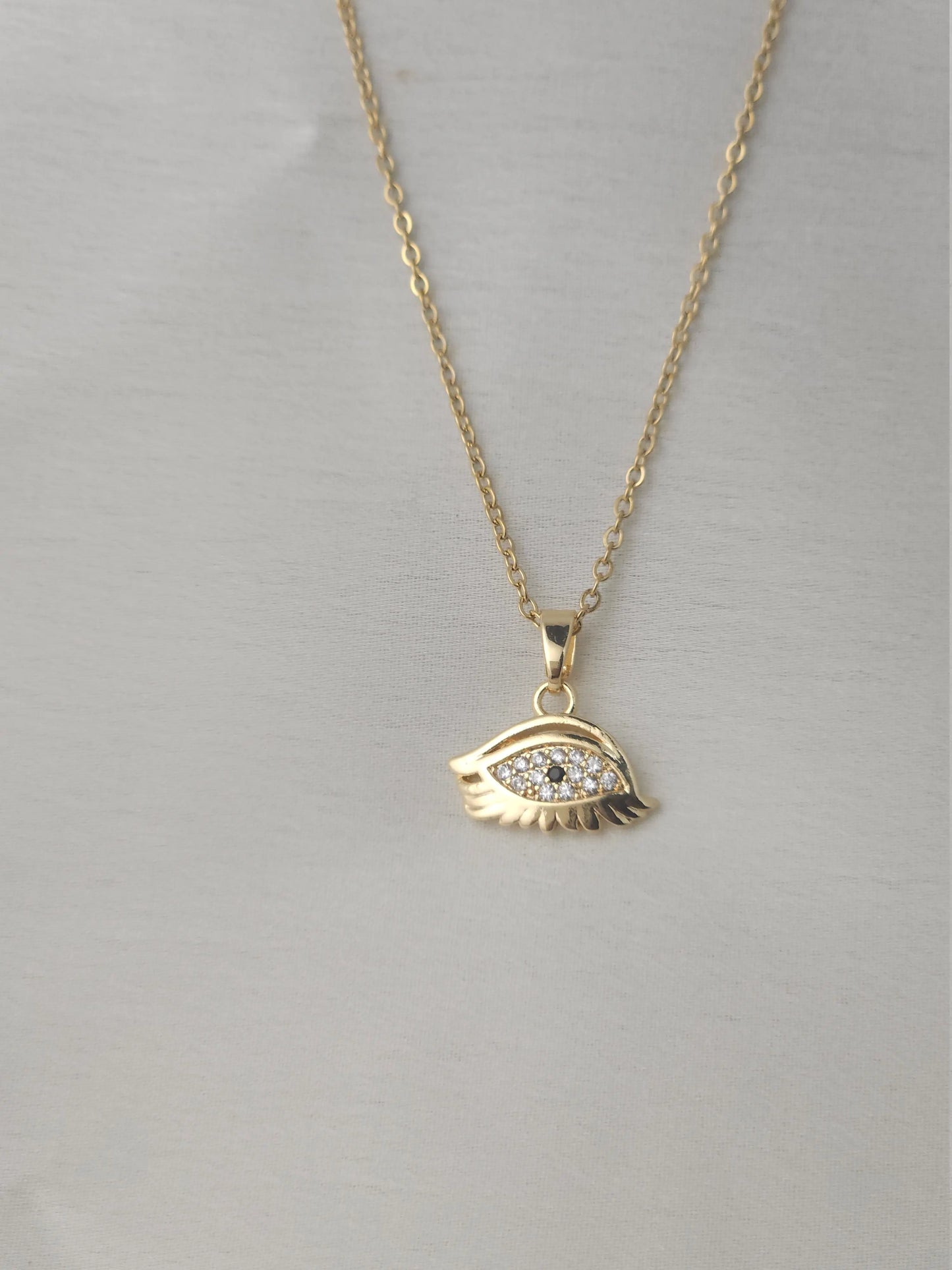 Gold Evil Eye Pendant Necklace – Crystal Studded Charm for Protection