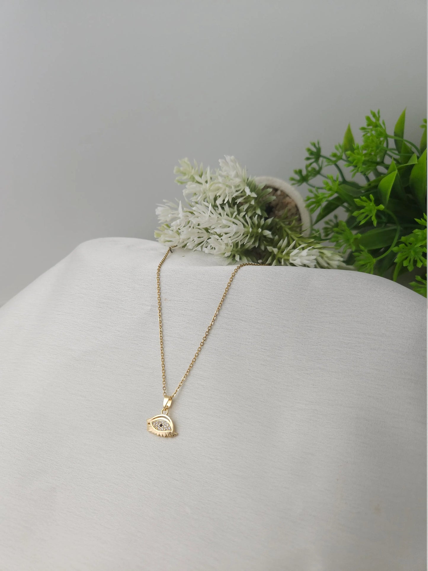 Gold Evil Eye Pendant Necklace – Crystal Studded Charm for Protection