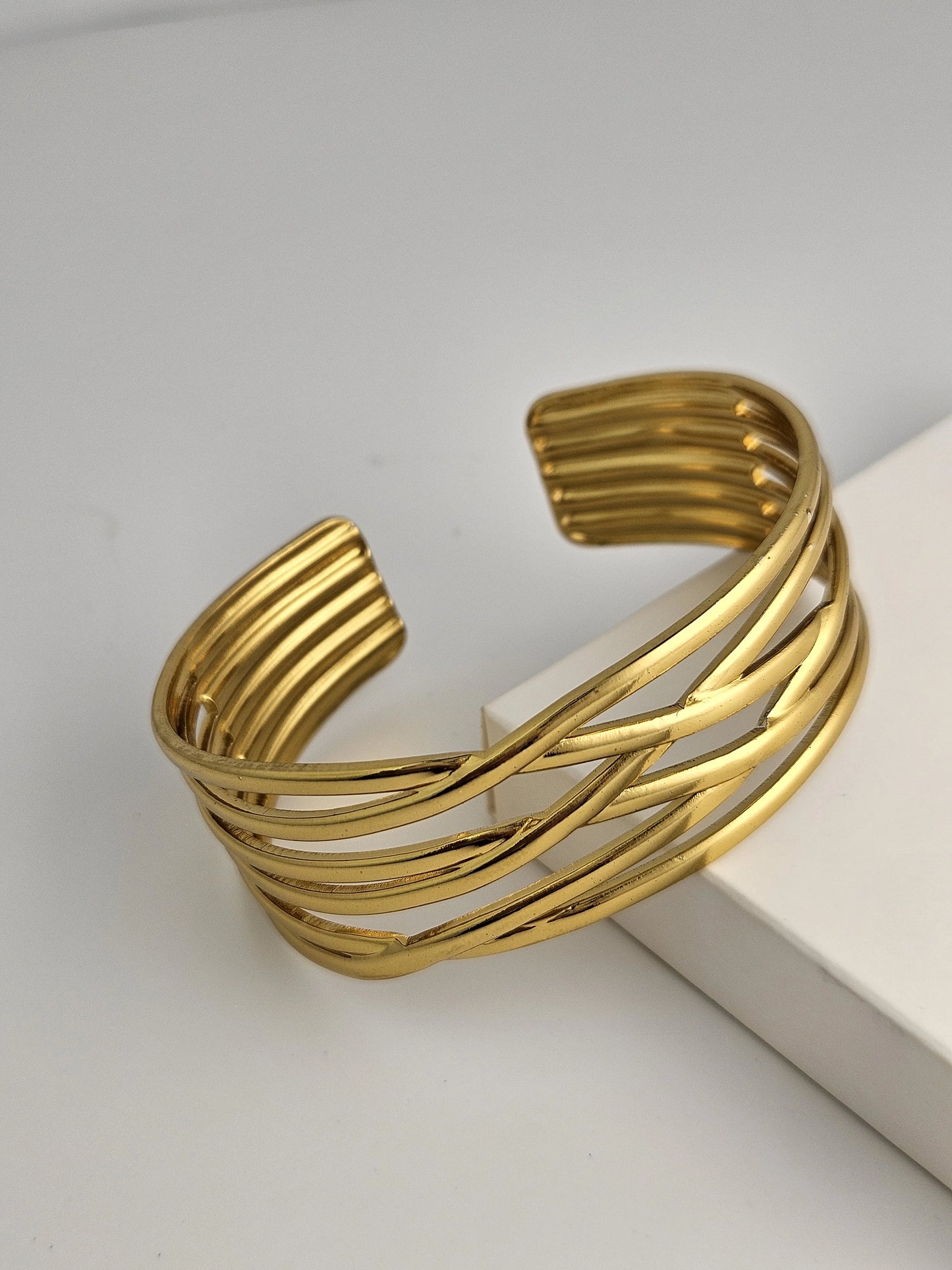 Intertwined Gold Cuff Bracelet – Modern Statement Jewelry | Vivoura Jewellery