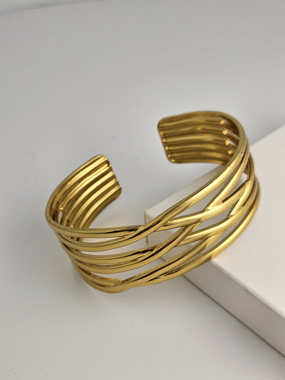 Intertwined Gold Cuff Bracelet – Modern Statement Jewelry | Vivoura Jewellery