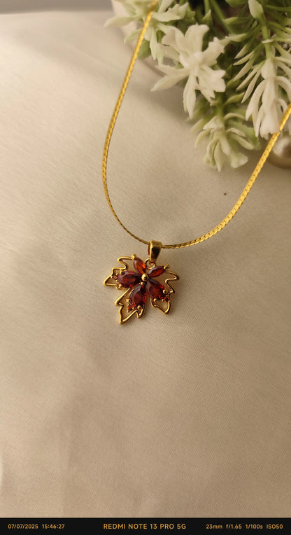 Maple Charm Gold Necklace – Red Crystal Pendant