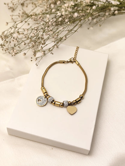 Gold Charm Bracelet with Heart & Crystal Disc – Stylish Statement Jewelry