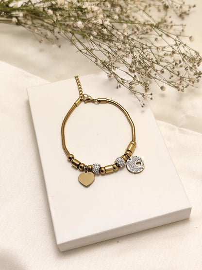 Gold Charm Bracelet with Heart & Crystal Disc – Stylish Statement Jewelry