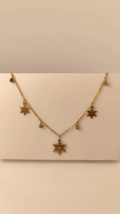 Elegant Gold Snowflake Necklace with Crystal Charms – Winter Jewelry