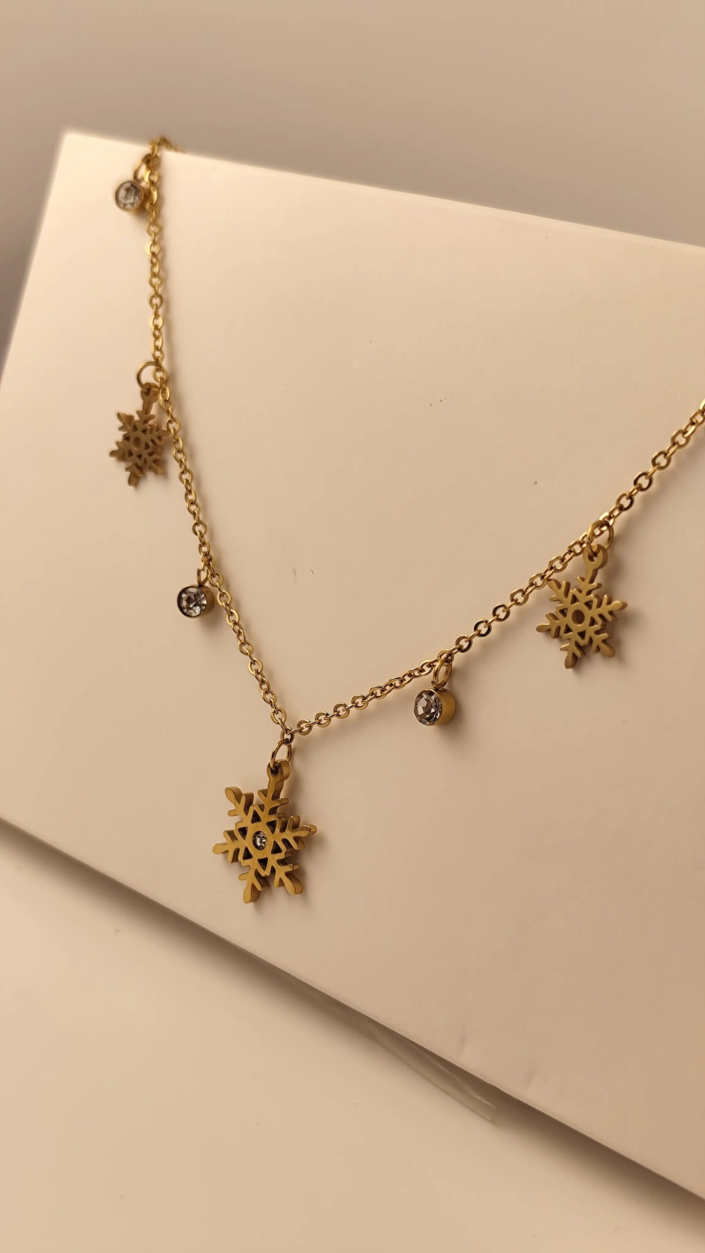 Elegant Gold Snowflake Necklace with Crystal Charms – Winter Jewelry