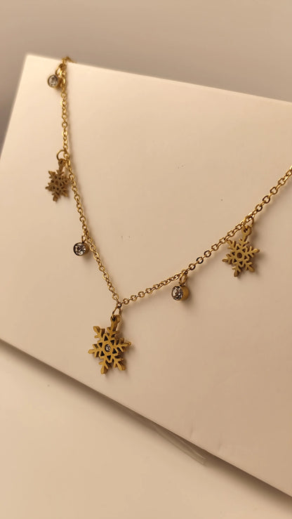Elegant Gold Snowflake Necklace with Crystal Charms – Winter Jewelry