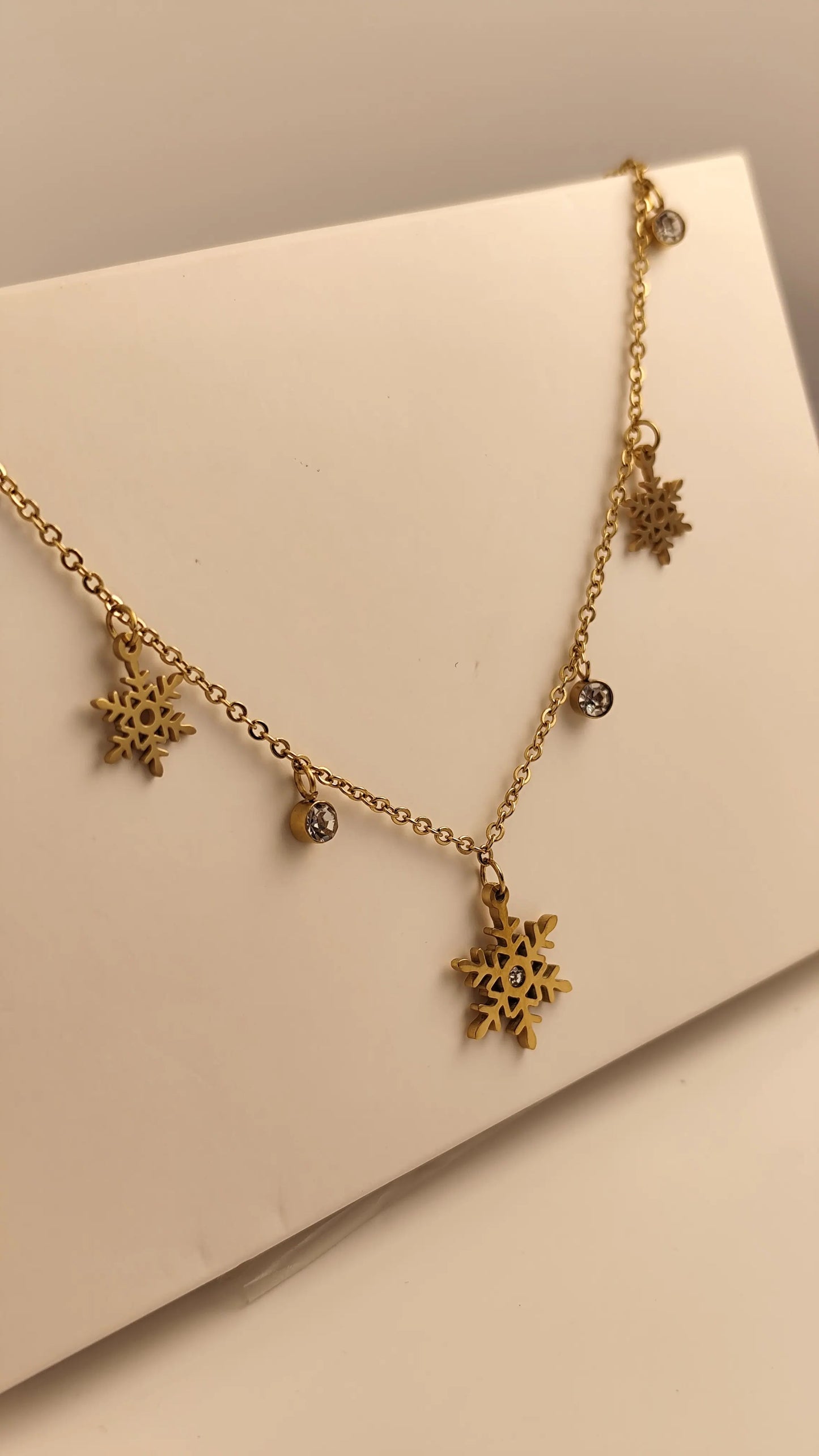 Elegant Gold Snowflake Necklace with Crystal Charms – Winter Jewelry