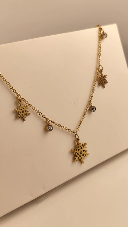Elegant Gold Snowflake Necklace with Crystal Charms – Winter Jewelry